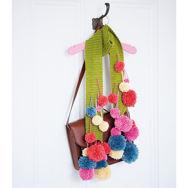 knitted colourful pom pom scarf